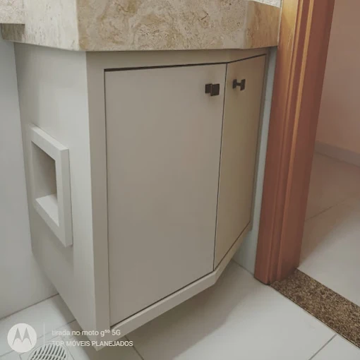 Guarda-roupa planejado de canto com portas de correr